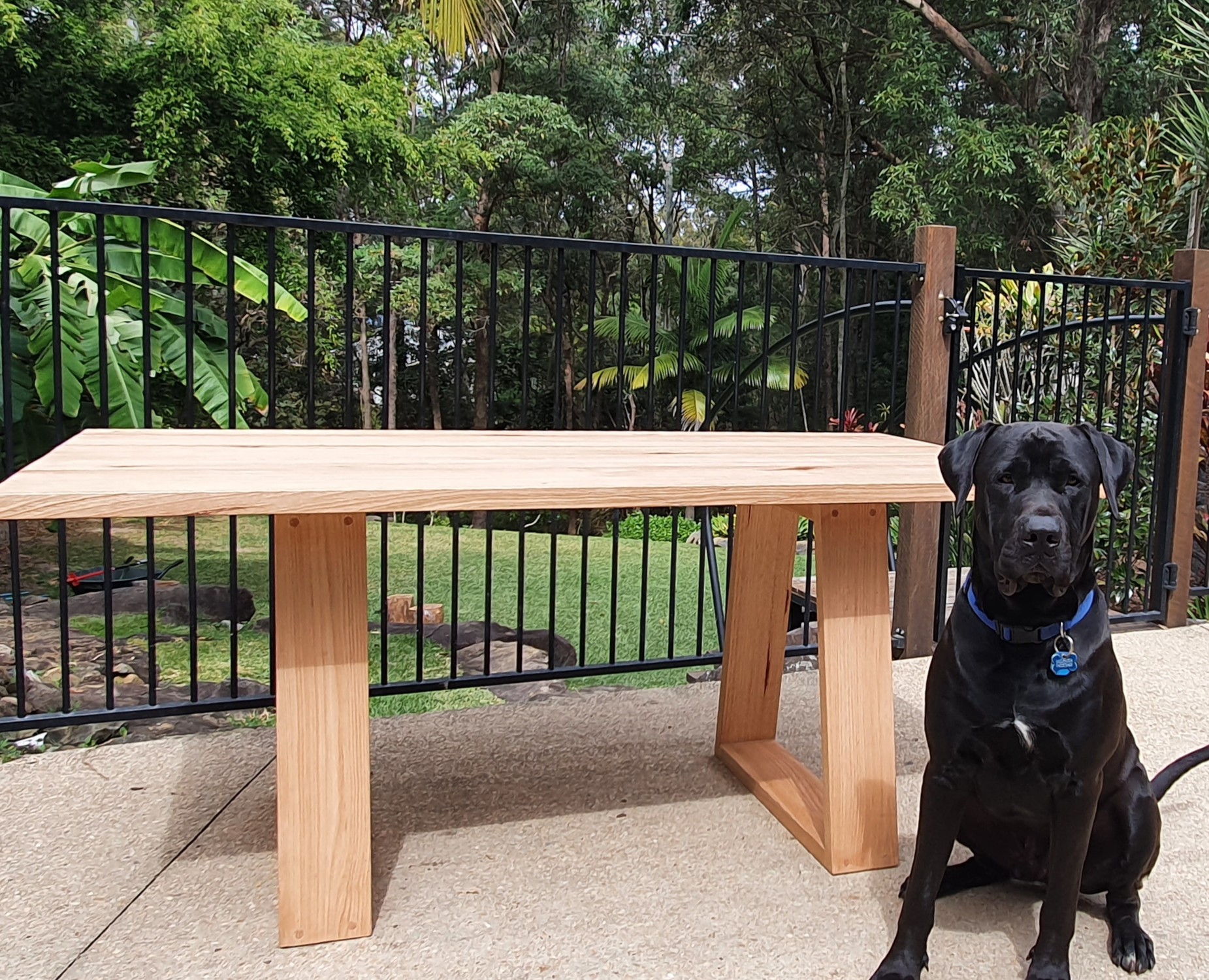 Dining table with angled legs.